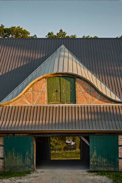 Beautiful roof construction comes to life with rib sheets, Gut Godderstorf, 23779 Neukirchen, Germany